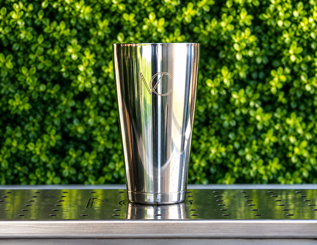 The Magic Shaker 2.0 — mirror-polished stainless steel shaker with the MC mark