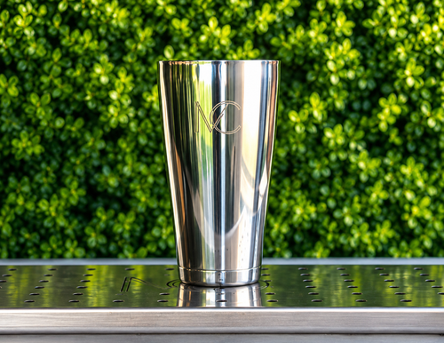 The Magic Shaker 2.0 — mirror-polished stainless steel shaker with the MC mark